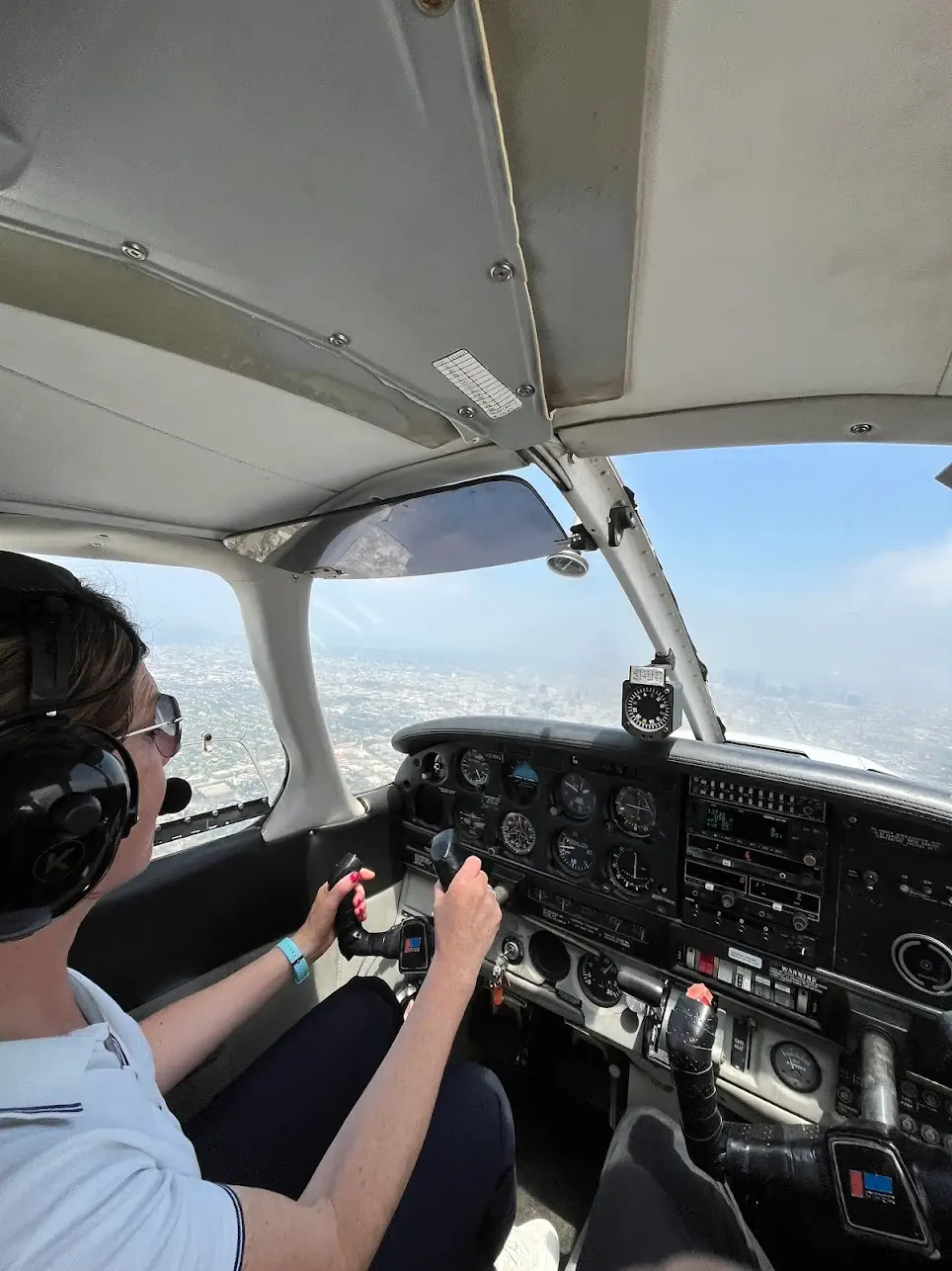 Students at Essence Flight School in Van Nuys Airport learning to fly in a Piper Archer cockpit